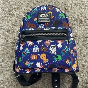 Mini Starwars loungefly bag with characters all over